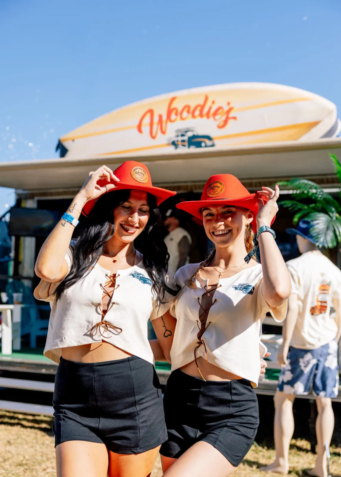 Brand ambassadors in Woodie's hats at festival brand activation management