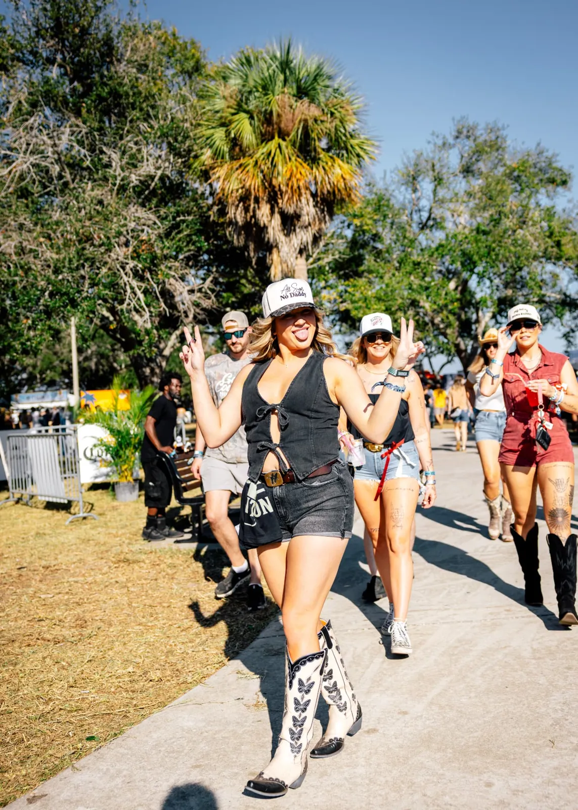 Festival fans in cowboy boots at St. Pete Country Fest, an event sponsorship brand experience